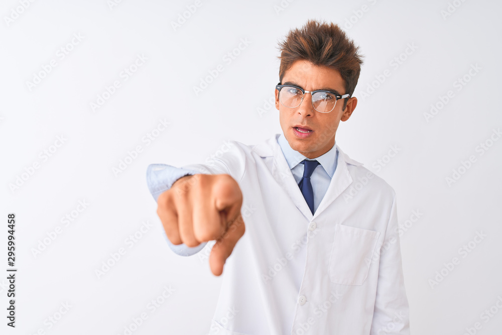 Young handsome sciencist man wearing glasses and coat over isolated white background pointing displeased and frustrated to the camera, angry and furious with you Young handsome sciencist man wearing glasses and coat over isolated white background pointing displeased and frustrated to the camera, angry and furious with you