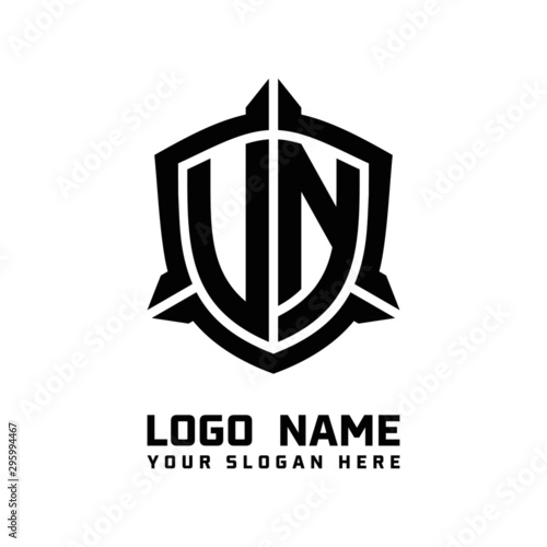 initial UN, VN letter with shield style logo template vector. shield shape black monogram logo