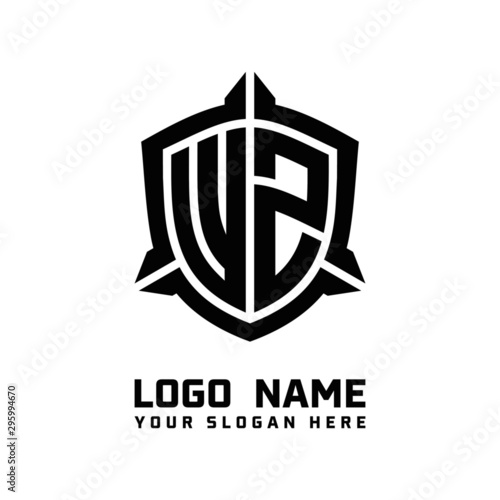 initial WZ letter with shield style logo template vector. shield shape black monogram logo