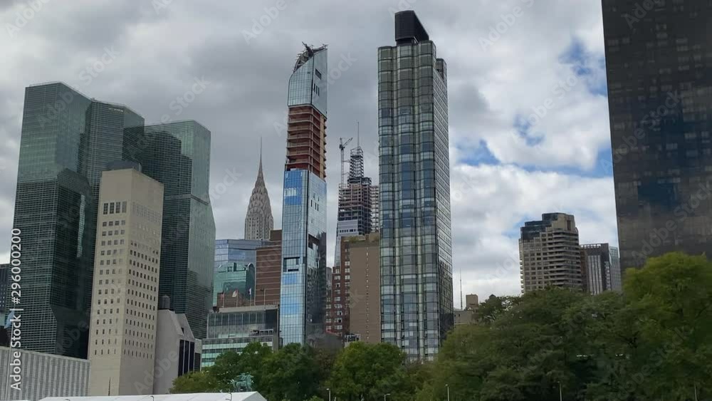 New York skyline Emire State building filmed from boat at Hudson river passing by. New York skyline Emire State building filmed from boat at Hudson river passing by.