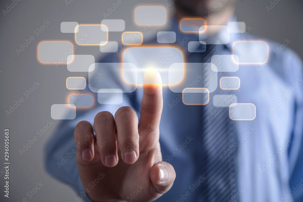 Businessman touching in virtual button. Business, Technology Businessman touching in virtual button. Business, Technology