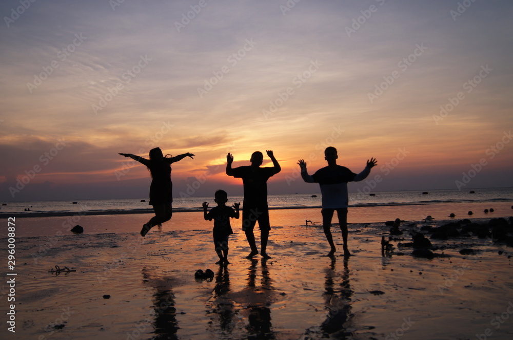 Fototapeta premium Shadow of people by the sea.