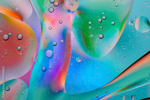 Abstract colorful macro background of oil drops photo