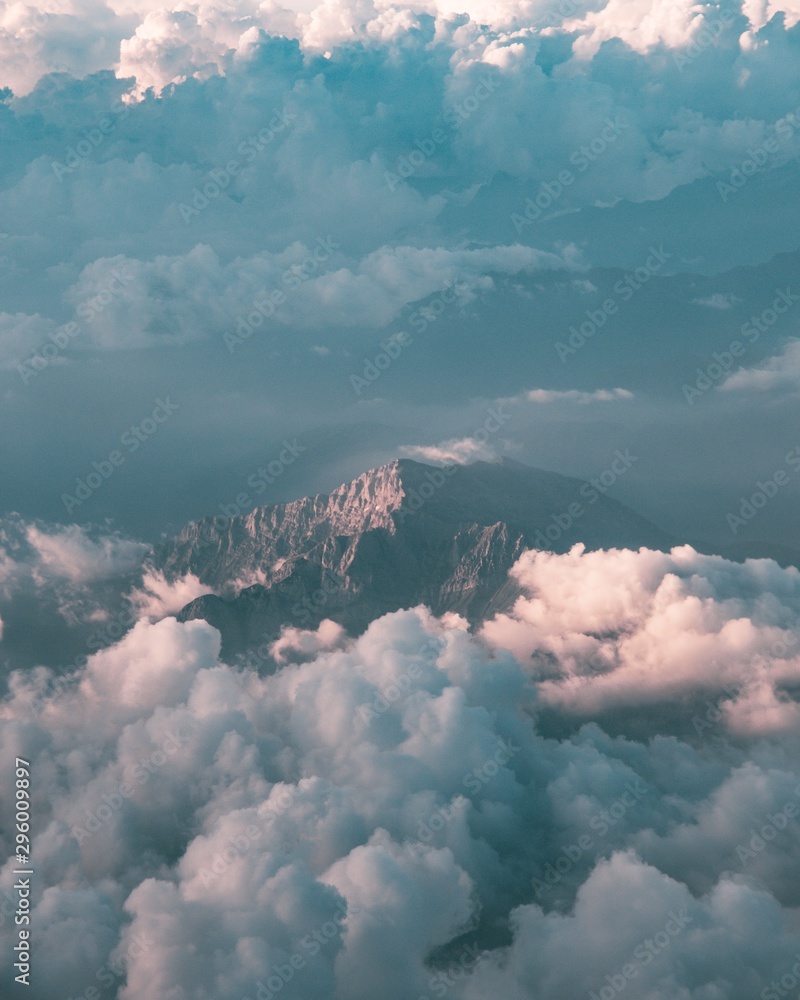 Mountain surrounded by clouds