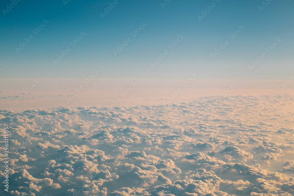 View of sky with clouds from airplane
