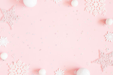 Christmas composition. White decorations on pastel pink background. Christmas, winter, new year concept. Flat lay, top view, copy space