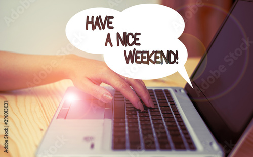 Writing note showing Have A Nice Weekend. Business concept for wishing someone that something nice happen holiday woman with laptop smartphone and office supplies technology photo