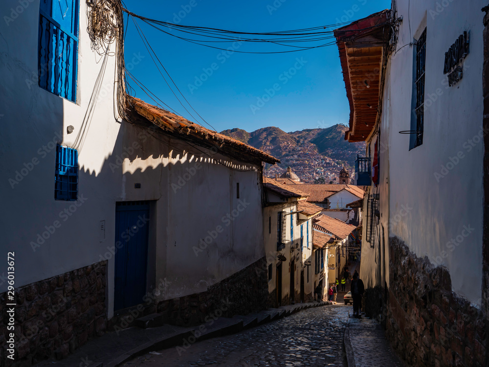 Narrow and gloomy streets in the old quarter of Cusco, Peru.  Cusco city, 12.08.2019