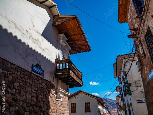 Traditional colonial balcony of the old houses of the city with narrow streets. City of Cusco, Peru