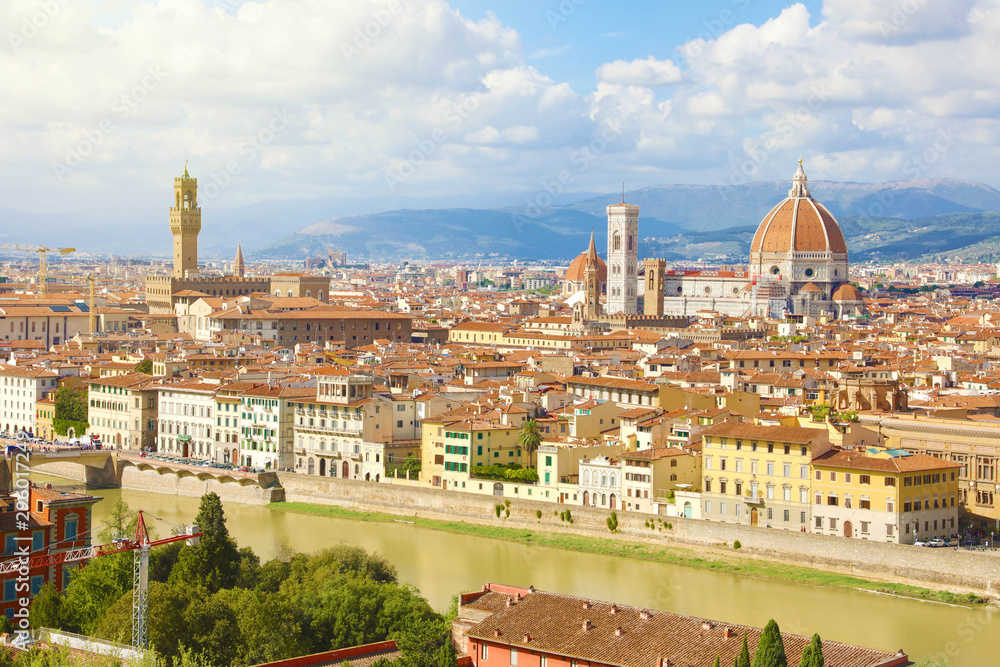 Panoramic view of the city of Florence with river Arno, Palazzo Vecchio palace and Cathedral of Santa Maria del Fiore (Duomo), Florence, Tuscany, Italy.