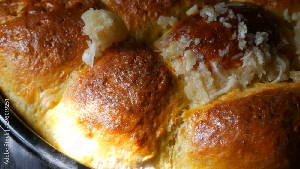 Freshly baked roast dough on a baking sheet only from the oven. Hot steam on Ukrainian national dumplings with garlic. Homemade baking Freshly baked roast dough on a baking sheet only from the oven. Hot steam on Ukrainian national dumplings with garlic. Homemade baking