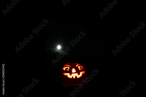 Halloween background with Moon. Pumpkin head