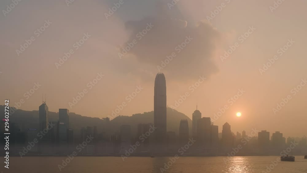 Hong Kong island at sunset. View taken from Kowloon waterfront Hong Kong island at sunset. View taken from Kowloon waterfront