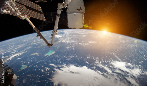 Fototapeta Naklejka Na Ścianę i Meble -  View of planet Earth from a space station window during a sunrise 3D rendering elements of this image furnished by NASA