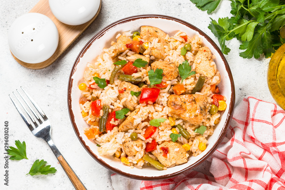 Rice with chicken and vegetables top view. Rice with chicken and vegetables top view.