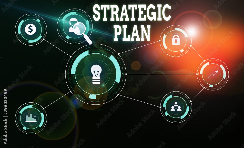 Conceptual hand writing showing Strategic Plan. Concept meaning a systematic process of envisioning a desired future Woman wear work suit presenting presentation smart device Conceptual hand writing showing Strategic Plan. Concept meaning a systematic process of envisioning a desired future Woman wear work suit presenting presentation smart device