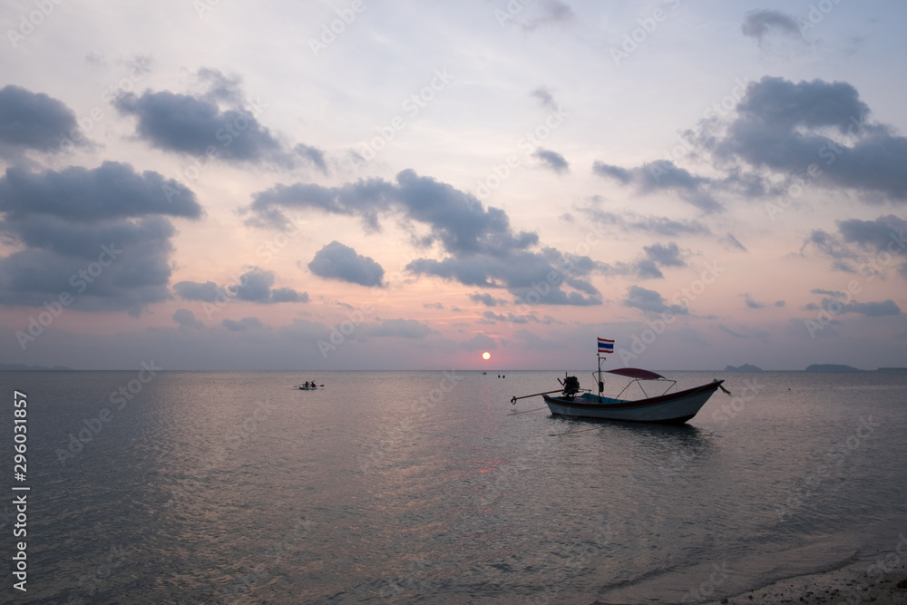 Fishing boat at the beach, sunset time at The Chumphon Archipelago, Thailand 