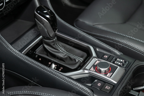 Close-up of the accelerator handle and buttons with  modern central console with  controls. automatic transmission gear of car , car interior. © Виталий Сова