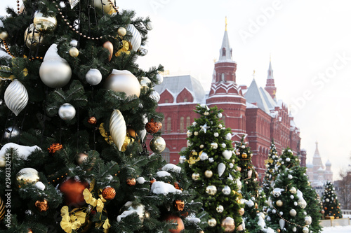 Christmas trees on Red Square in Moscow, New Year celebration in Russia. Christmas decorations on background of State historical museum, russian tourist landmark