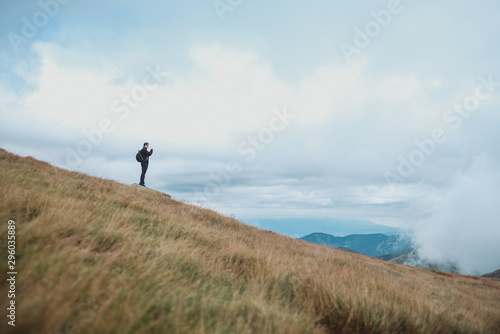 man on top of mountain in low tatras