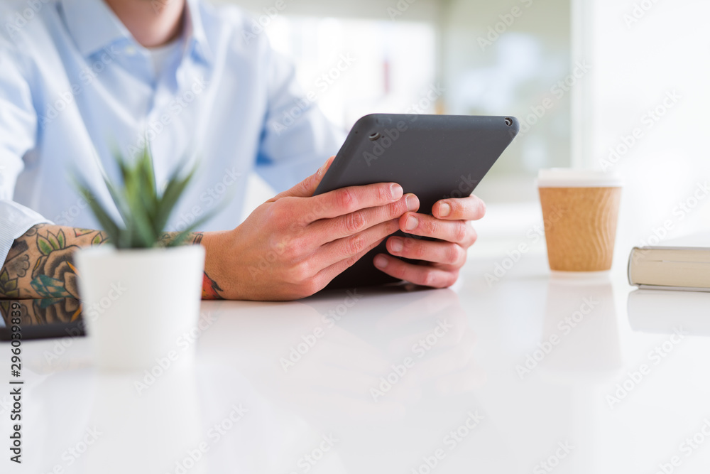 Close up of business man working using touchpad tablet Close up of business man working using touchpad tablet