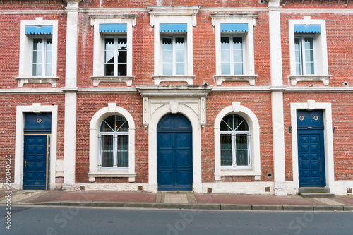 typical Norman stone and brick house front with colorful contrasts