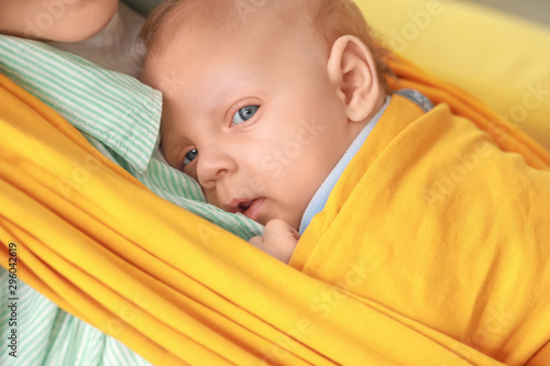 Young mother with little ba...