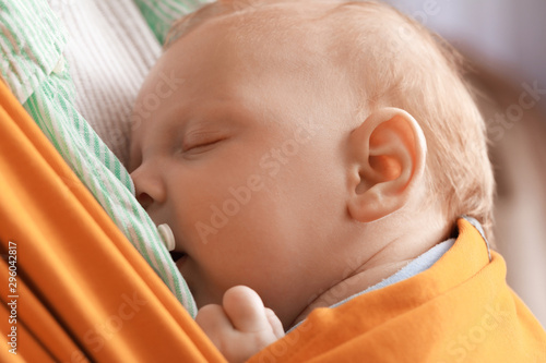 Young mother with little ba...