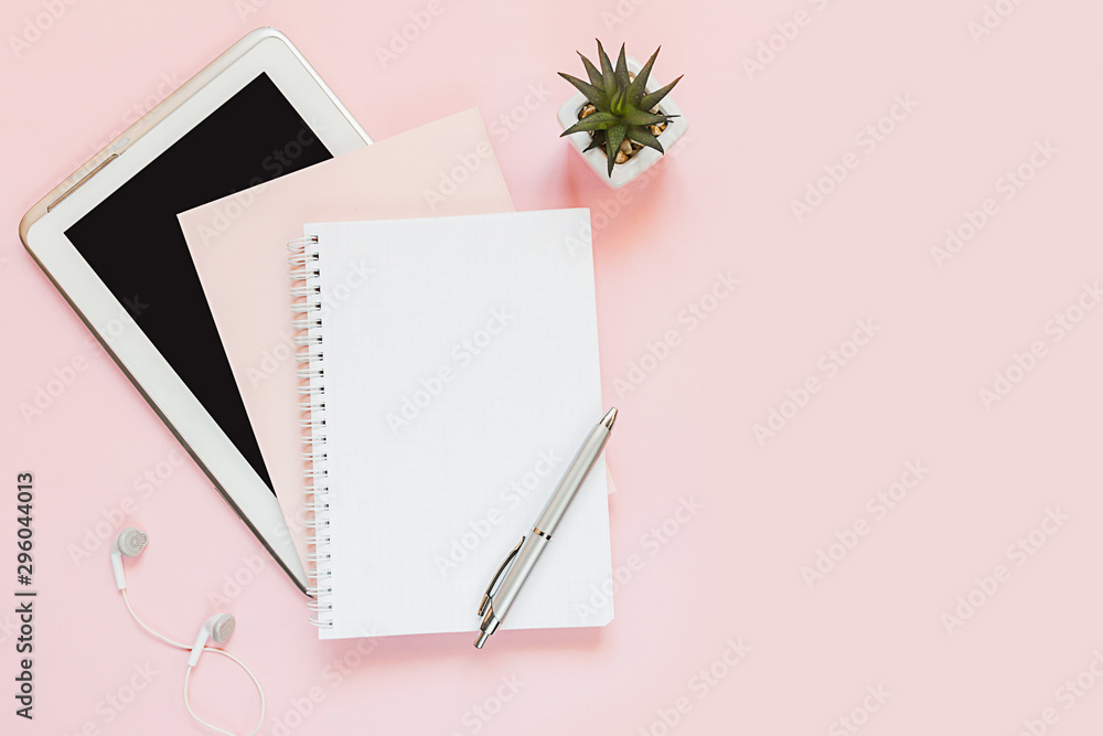 Plakat Top view of a flat lay of desktop and notepads for writing down goals and plans. 2020 New Year's goal, plan, action text on notepad with office accessories. Business motivation, inspiration concept.
