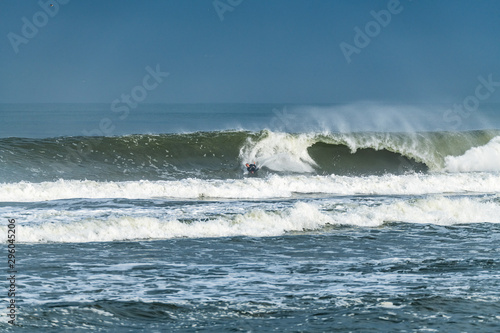 Bodyboarder surfing ocean wave