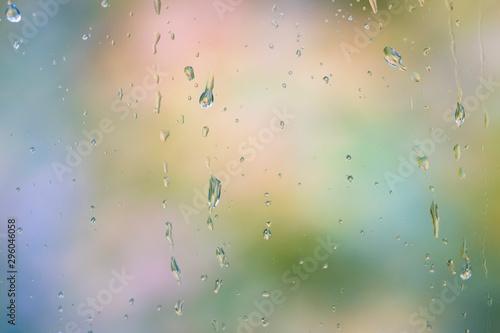Drops of water on a window pane on a rainy autumn day