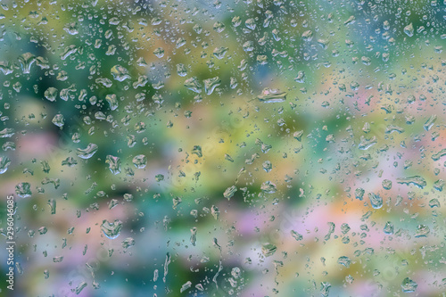 Drops of water on a window pane on a rainy autumn day