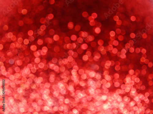 abstract red background soft blurred christmas lights garland