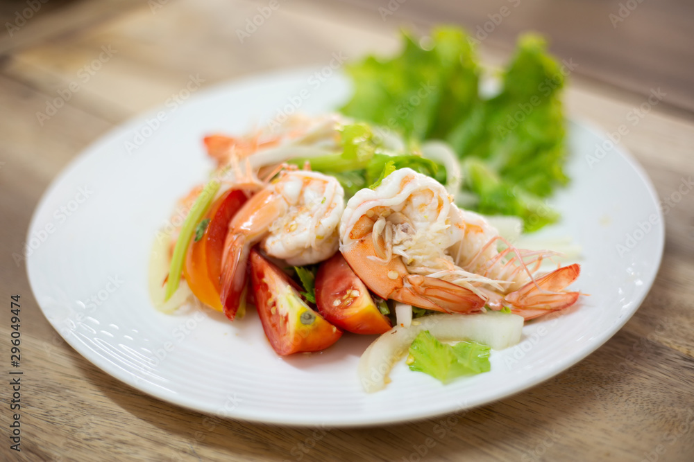 Spicy salad with fresh shrimps healthy asian food for diet lifestyle. Spicy salad with fresh shrimps healthy asian food for diet lifestyle.