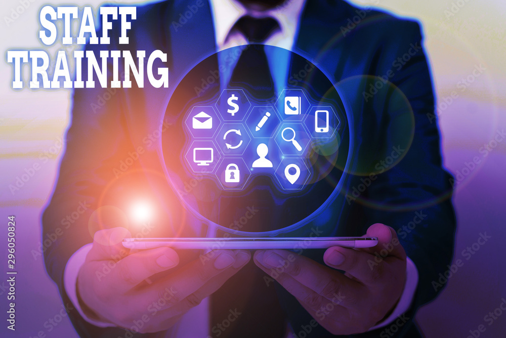 Writing note showing Staff Training. Business concept for program that helps employees learn specific knowledge Writing note showing Staff Training. Business concept for program that helps employees learn specific knowledge