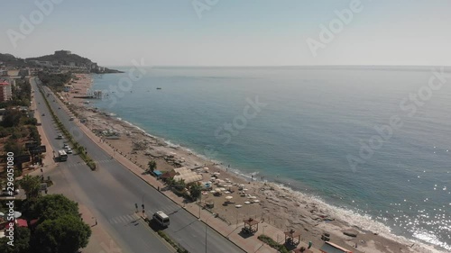 Panoramic aerial view of urban landscape, coastline and beaches from Mahmutlar to Kargicak on the Turkish Mediterranean Coast. Tourists and enjoy their vacation. The D400 runs alongside the beaches. photo