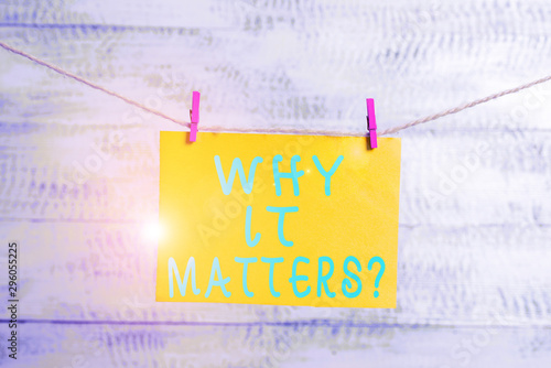 Conceptual hand writing showing Why It Matters question. Concept meaning ask demonstrating about something he think is important Clothespin rectangle shaped paper reminder white wood desk