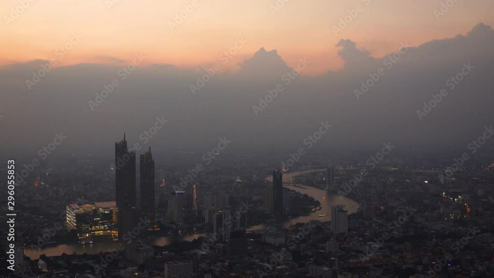 Aerial Skyline of Bangkok Cityscape from Mahanakorn Skywalk and business urban downtown with Beautiful Twilight Peak at Sunset, Cityscape capital and financial district center of Bangkok, Thailand Aerial Skyline of Bangkok Cityscape from Mahanakorn Skywalk and business urban downtown with Beautiful Twilight Peak at Sunset, Cityscape capital and financial district center of Bangkok, Thailand