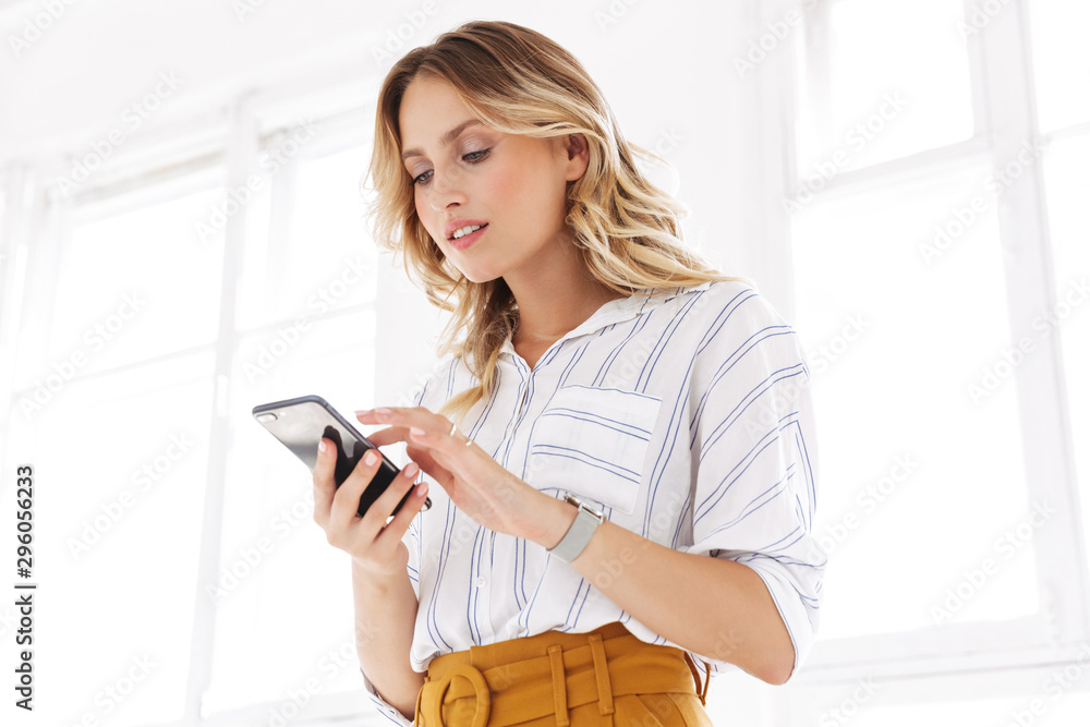 Attractive young blonde woman wearing shirt Attractive young blonde woman wearing shirt