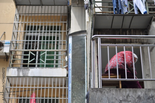 lonely grandma on the balcony