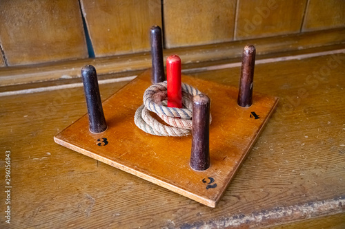 An old fashioned wooden hoopla or quoits game