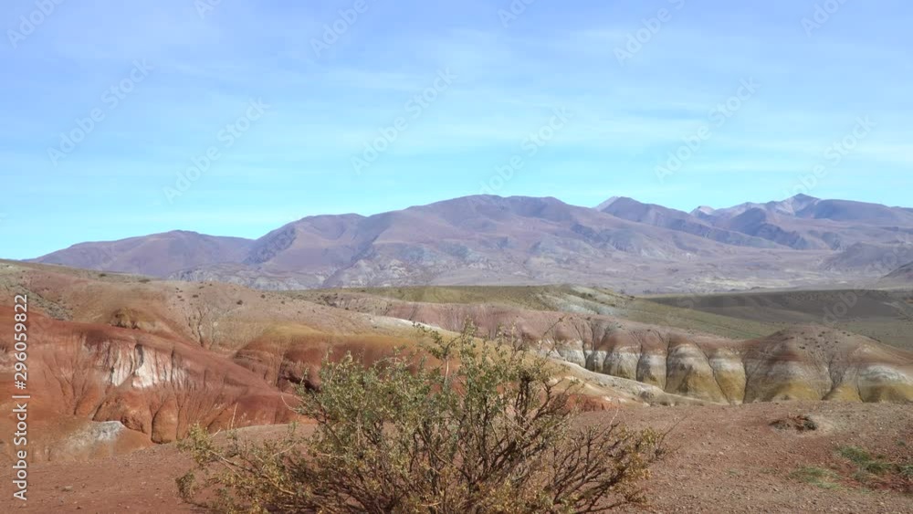Altai mountains valley slide shot, natural park in Siberia. Famous Altai Martian landscape. Altai mountains valley slide shot, natural park in Siberia. Famous Altai Martian landscape.