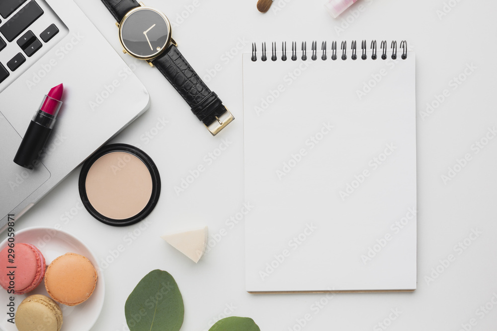 Flat lay arrangement with laptop and notebook Flat lay arrangement with laptop and notebook