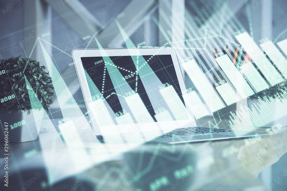 Stock market graph on background with desk and personal computer. Multi exposure. Concept of financial analysis. Stock market graph on background with desk and personal computer. Multi exposure. Concept of financial analysis.