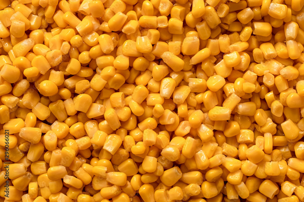 Background of canned sweet corn. Top view. Background of canned sweet corn. Top view.