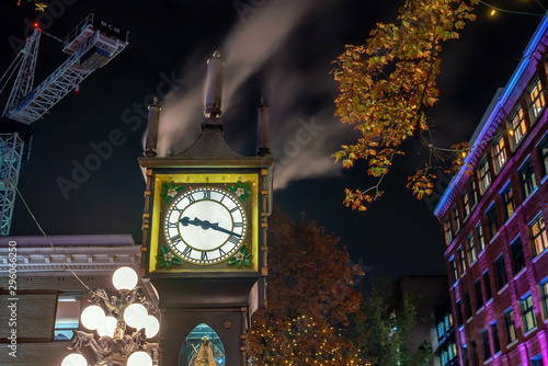 Old Steam Clock in Vancouver's historic Gastown district at night photo