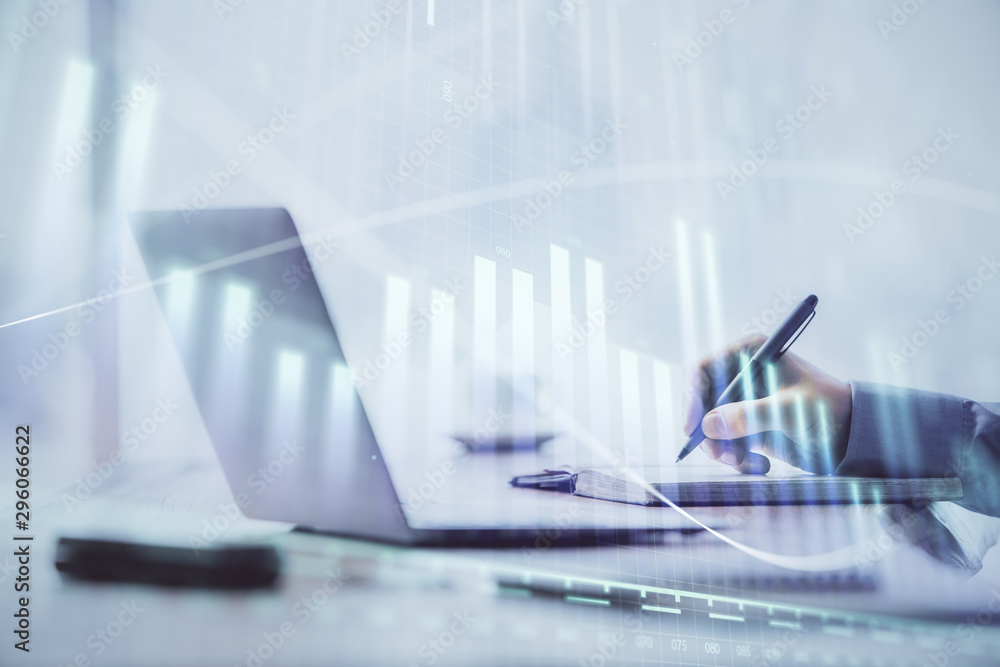 Multi exposure of forex chart with man working on computer on background. Concept of market analysis. Multi exposure of forex chart with man working on computer on background. Concept of market analysis.