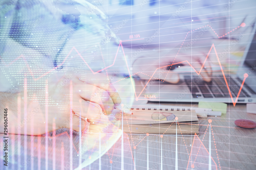 Multi exposure of financial graph with man works in office on background. Concept of analysis. Multi exposure of financial graph with man works in office on background. Concept of analysis.