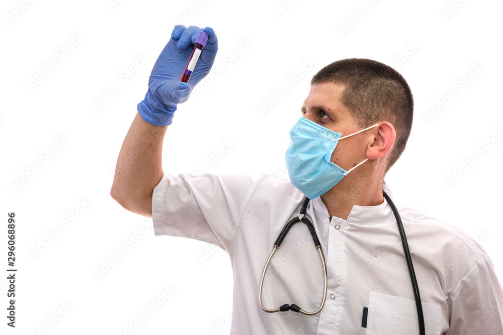 Young doctor in white uniform holding test tube with blood sample isolated on white background. Young doctor in white uniform holding test tube with blood sample isolated on white background.