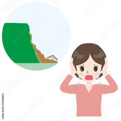 崖崩れ　嘆く女性